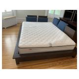 60 INCH PLATFORM BED WITH BLUE ACCENT PILLOWS