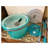 NEWLY USED SPIN MOP AND BUCKET