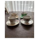 4 CUPS AND SAUCERS