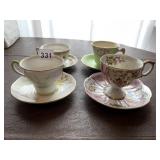 4 CUPS AND SAUCERS