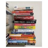 STACK OF BOOKS INCLUDING JIMMY BUFFETT TALES FROM