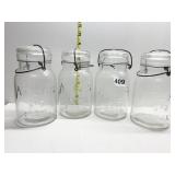 (4) ATLAS E-Z SEAL CLEAR GLASS JARS WITH LIDS