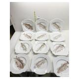 TWELVE VINTAGE FISH PLATES