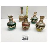 FIVE VINTAGE MINI ROUND BOTTLES OF LIQUORS