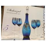 CIRCLE WARE DECANTER AND 4 GLASS IN OB NEVER USED