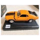 DIE CAST MUSTANG CAR ON STAND