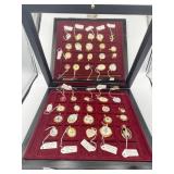 DISPLAY CASE HOLDING PORCELAIN PENDANTS , 20 FROM