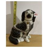 PORCELAIN BLACK AND WHITE DOG W/ GOLD LOCK 9.5" H