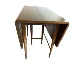 MID-CENTURY PAUL MCCOBB DROP SIDE DINING TABLE.