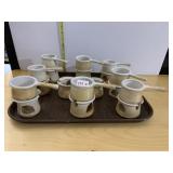 NINE BUTTER DISHES W/ VOTIVE BASES