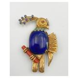 OUTSTANDING PIN SET IN 18 KARAT GOLD TWO- AND