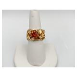 14K YELLOW GOLD SZ. 7 - GARNET RING W/ OPEN