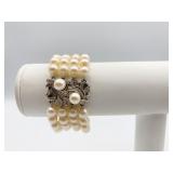 4 STRAND PEARL BRACELET WITH 14 KT WHITE GOLD