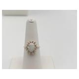 14K GOLD RING W/ OPAL CENTER LOOP DESIGN SIDES W/