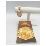 COSTUME WATCH AND ROLEX BOOK