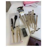 MANY NEW MAKE UP BRUSHES, EYE LASH CURLER, ETC.