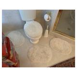 3 BEIGE SMALL OVAL BATH RUGS AND BEIGE TOILET LID