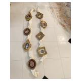 DECORATIVE HANGERS WITH MINI FRAMES AND PICTURES,