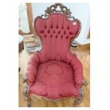 HEAVILY CARVED BURGUNDY UPHOLSTERED FIRESIDE