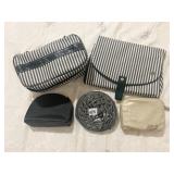 OSCAR DE LA RENTA TOILETRIES KIT WITH SOME WEAR,
