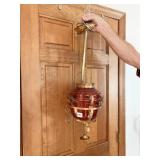 HANGING CRANBERRY GLASS AND HAMMERED BRASS LIGHT