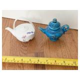 MINIATURE TEA POTS, ONE WITH ASIAN CHARACTER