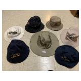ASSORTED BUCKET HATS WITH TRAVEL DESTINATIONS
