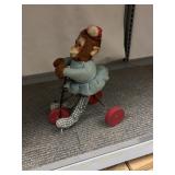 VINTAGE MOKEY RIDING BIKE