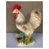 ROOSER FIGURINE SMALL CHIPS OF PAINT COMING OFF