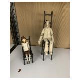 WOODEN MAN & PINOCCHIO ON METAL CHAIRS, PINOCCHIO