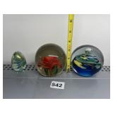 THREE PAPERWEIGHTS INCLUDING OCEAN SCENE AND