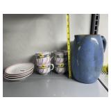 GERMAN SAUCERS AND 4 CUPS PLUS BLUE PITCHER