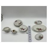 CHILDS TEA SET ROSE PATTERN ONE HAS CHIP
