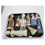 EIGHT FIGURINES INCLUDING TWO WHITE BISQUE ,