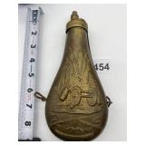 BRASS POWDER HORN W/ WAGON WHEEL DESIGN