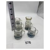 GROUP OF FIVE BLUE BASE MATCHING SHOT GLASSES AND