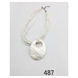 MULTI STRAND WHITE BEADED NECKLACE LARGE SHELL