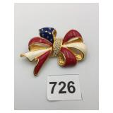 JOAN RIVERS RED WHITE AND BLUE BOW PIN WITH