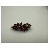 10 KARAT REDSTONE PIN WITH A FLORAL DESIGN