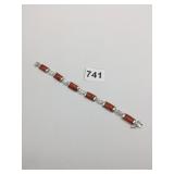 STERLING SILVER POLISHED STONE POSSIBLY ORANGE