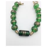 GREEN GLASS BALL BEAD BRACELET GOLD AND BLACK