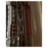 WOODEN VINTAGE SIGNS AND OTHER ITEMS HANGING IN