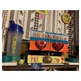 ITEMS ON WALL BETWEEN BASEMENT AND CLOSET DOOR ON