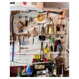 SECTION OF GARAGE WALL INCLUDING BOLT CUTTERS,