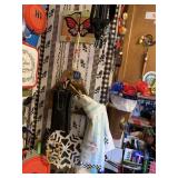 BUNGEES AND TRINKETS ON CORNER OF KITCHEN WALL