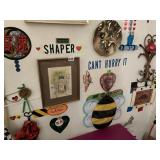 ITEMS ON WALL IN LIVING ROOM, FRAMED