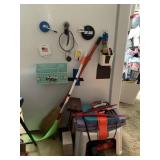 ITEMS ON AND NEXT TO FRIDGE, GIANT FLY SWATTER,