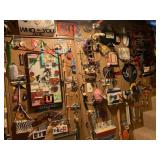 ITEMS HANGING ON BASEMENT STAIRWAY RIGHT WALL AND