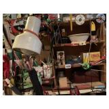 ITEMS ON SHELVES AND WALL OF BASEMENT STAIRS, SEE