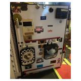 ITEMS ON THE SIDE OF THE STOVE, POTHOLDERS AND